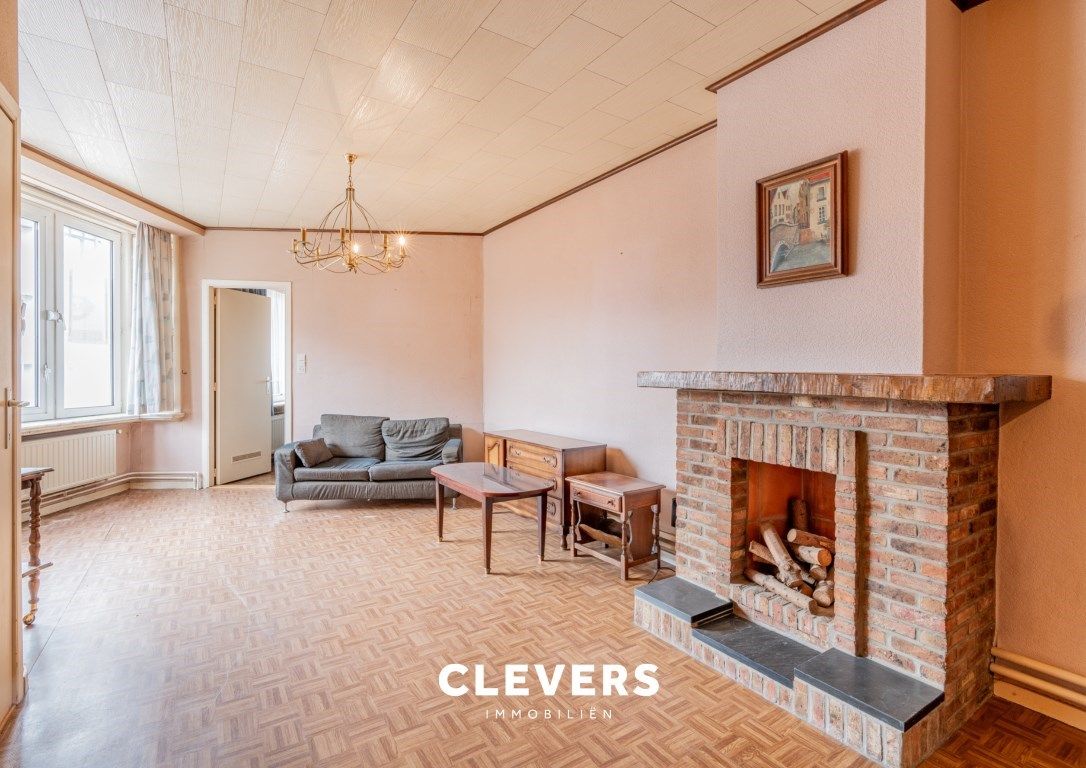 Opbrengsteigendom met lopende handelshuur + 2 appartementen foto 11