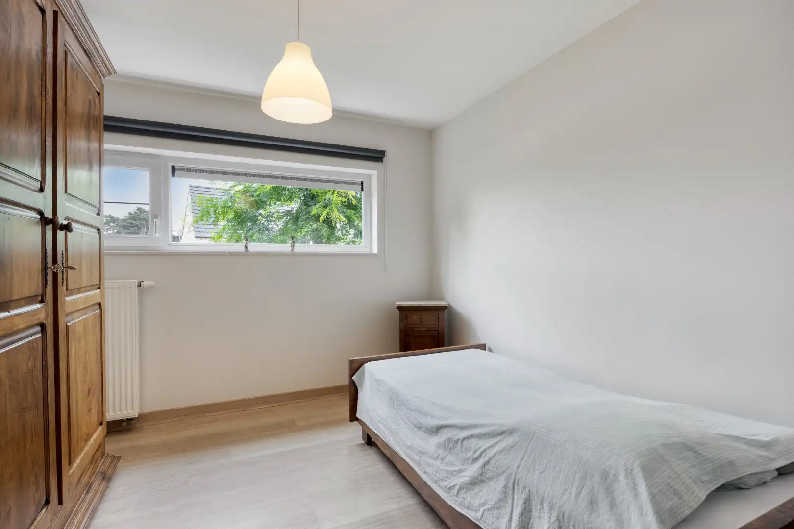 Gelijkvloers appartement met 2 slpk, 2 parkings en 2 kelderbergingen. foto 27