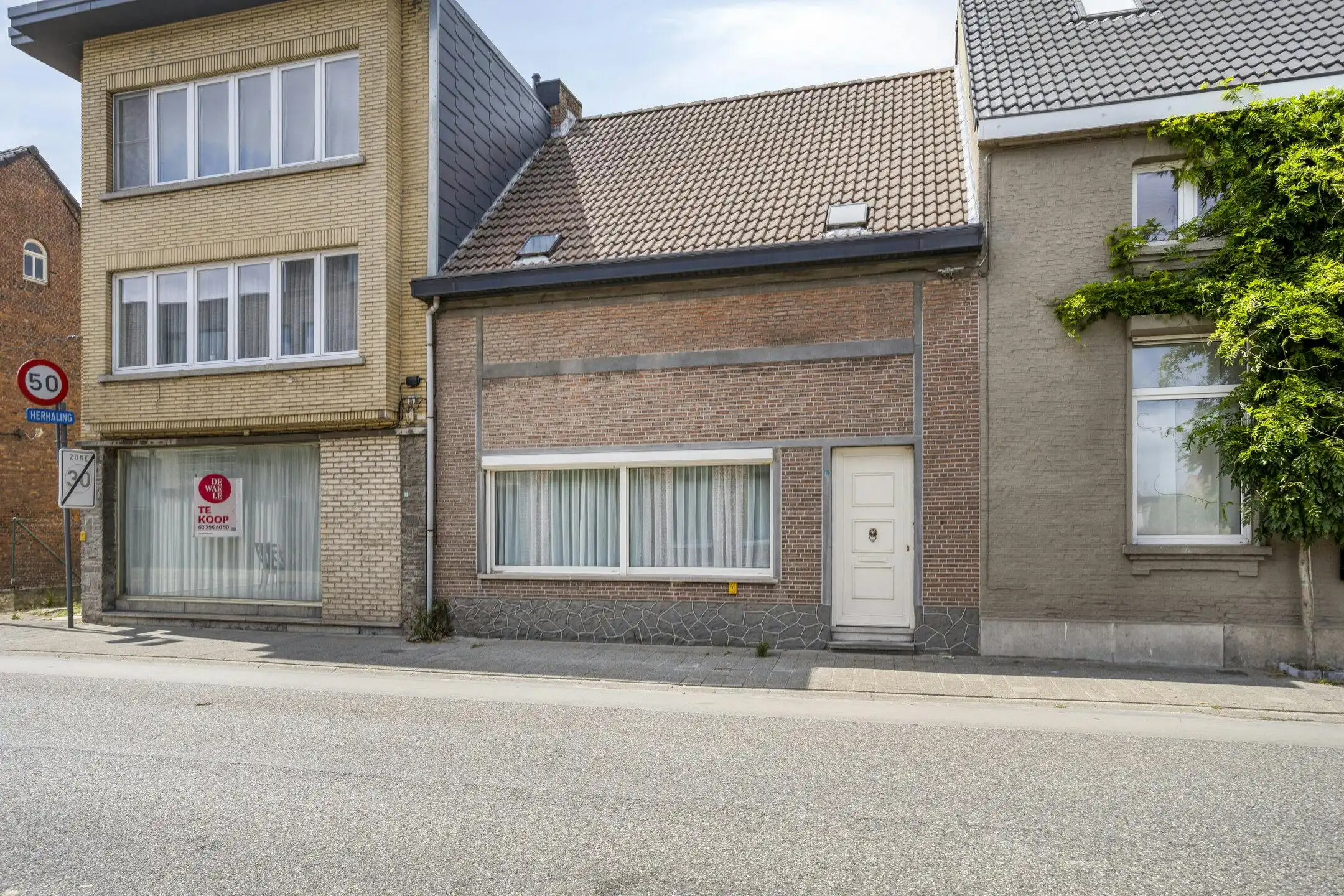 Te renoveren huis met vier slaapkamers en tuin in Kruibeke foto 19