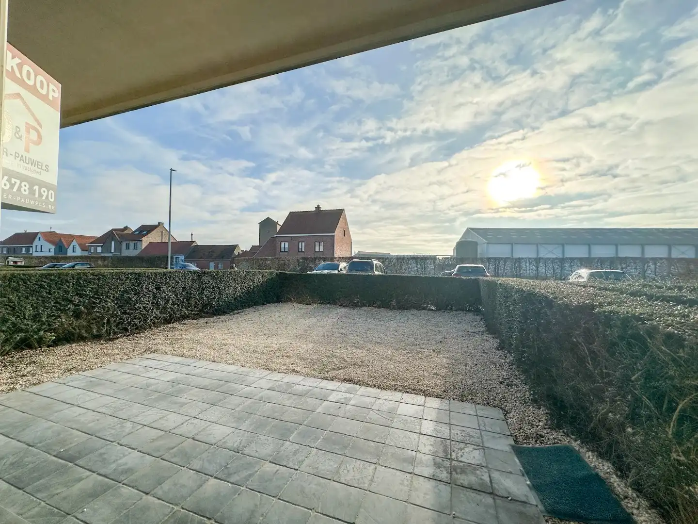 Lichtrijk gelijkvloers appartement met 2 slpk, garage en autostandplaats foto 30