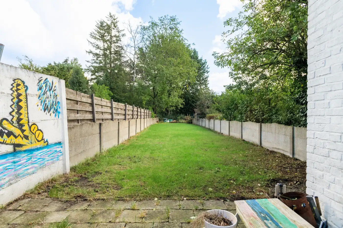 Deels gerenoveerde gezinswoning met 3 à 4 slpk. en tuin foto 21
