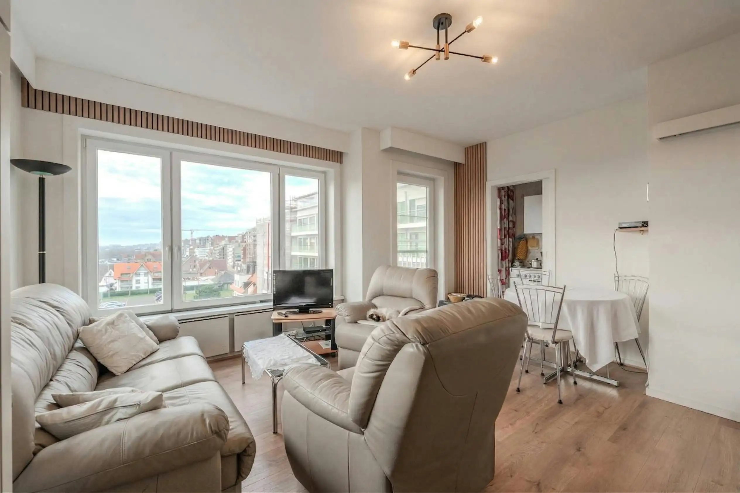 Zonnige hoekstudio met terras en open zicht ! foto 6