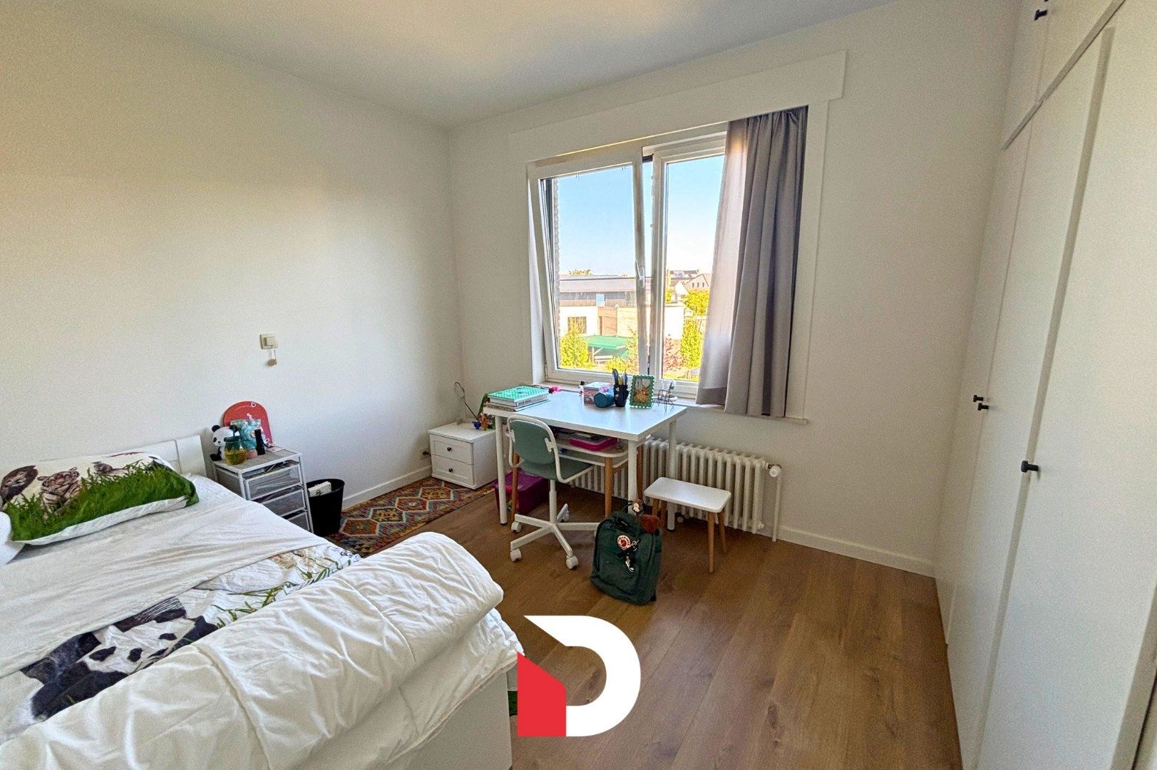 Rustig en lichtrijk appartement met drie slaapkamers en garagebox foto 11