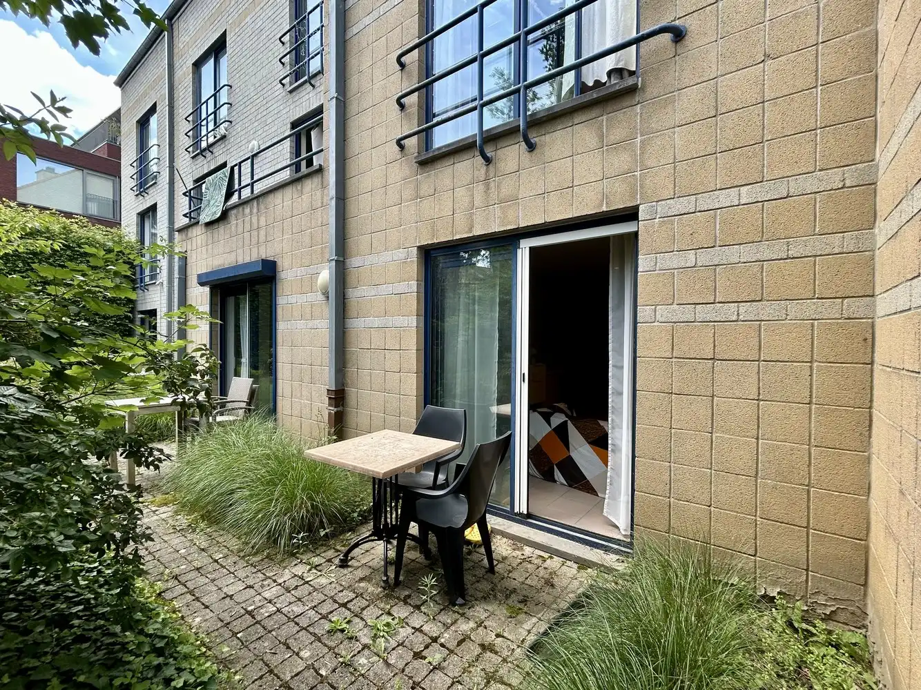 Deels gemeubelde studio met terras en staanplaats te Leuven foto 7