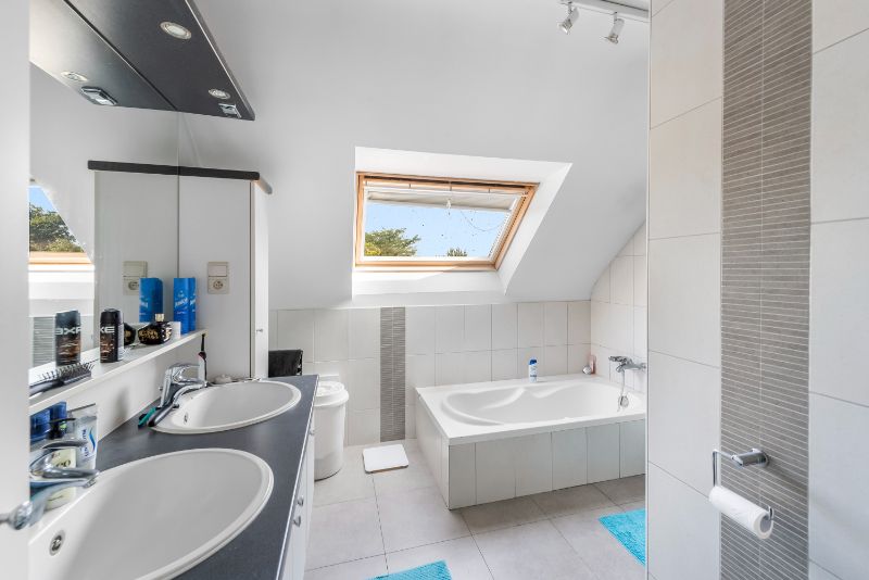 Ruim 3 slaapkamer duplex-appartement van 130m² met terras op zuid-oosten, ondergrondse staanplaats en kelder foto 15