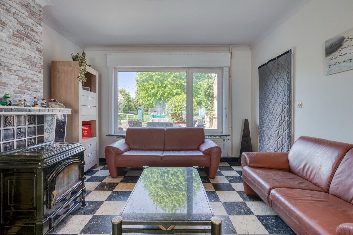 Te renoveren woning met naastliggend bouwperceel! foto 5