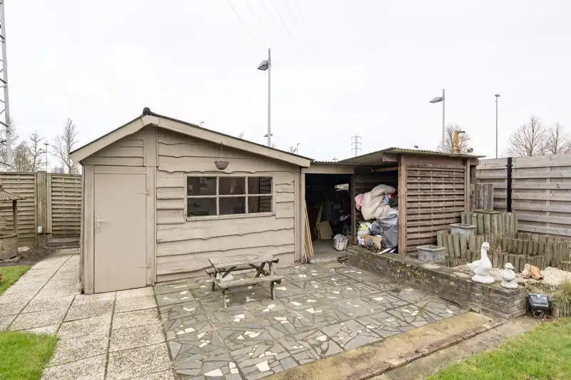 Te renoveren, rustige gelegen halfopen woning met 3 slaapkamers, garage en tuin te koop in Sint-Baafs-Vijve! foto 24