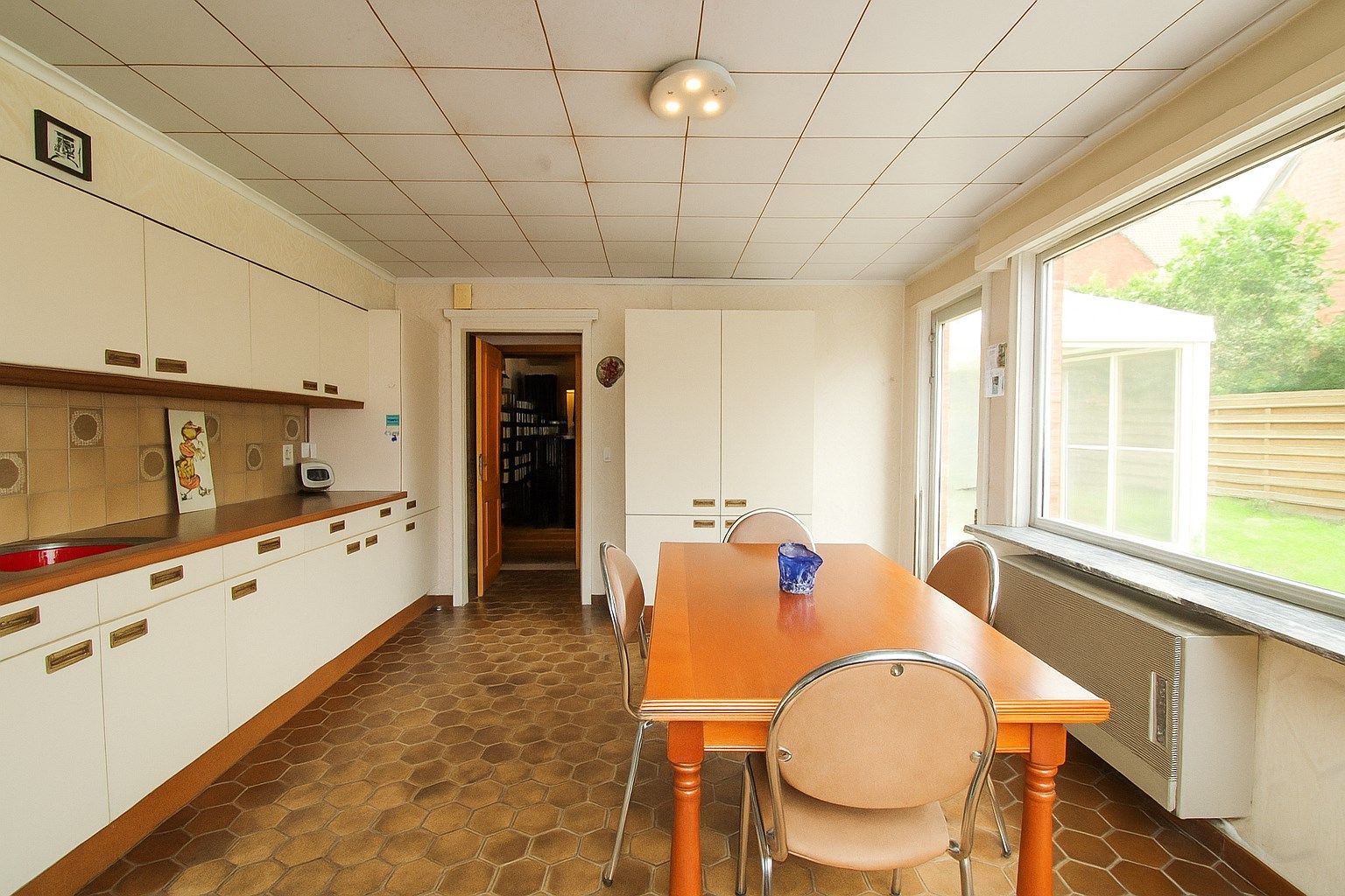 Te koop: Ruime en charmante halfopen bebouwing met uitgestrekte tuin, optie tot vijf slaapkamers en veel renovatiepotentieel in het centrum van Sint-Niklaas foto 7
