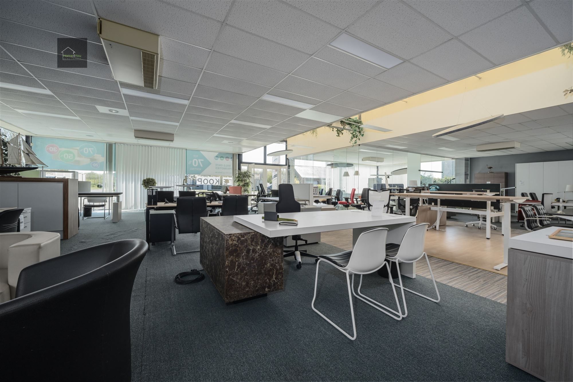  Multifunctioneel bedrijfsgebouw met toonzaal, magazijn, kantoren én woonst op toplocatie. foto 4