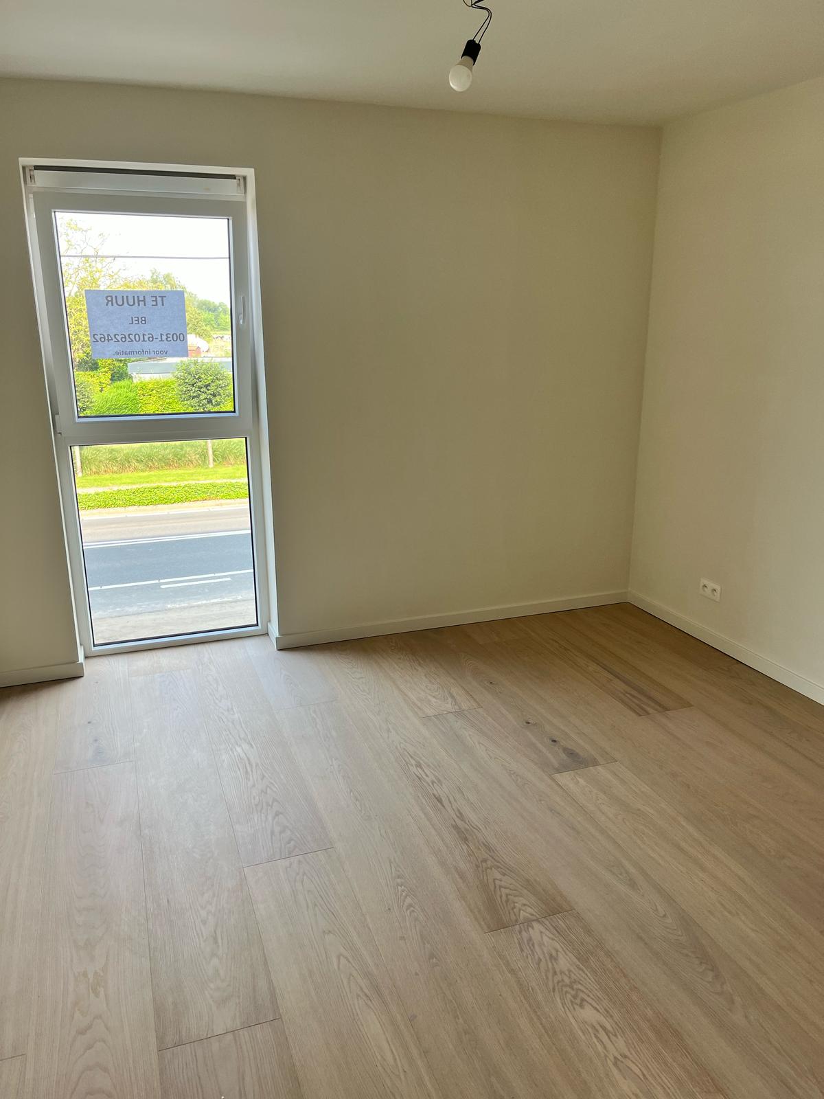 Luxueus nieuwbouw appartement met terras te Molenbeersel. foto 5