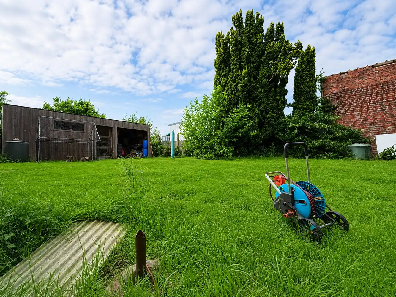 Ruime woning met  4 slaapkamers en gezellige tuin foto 18
