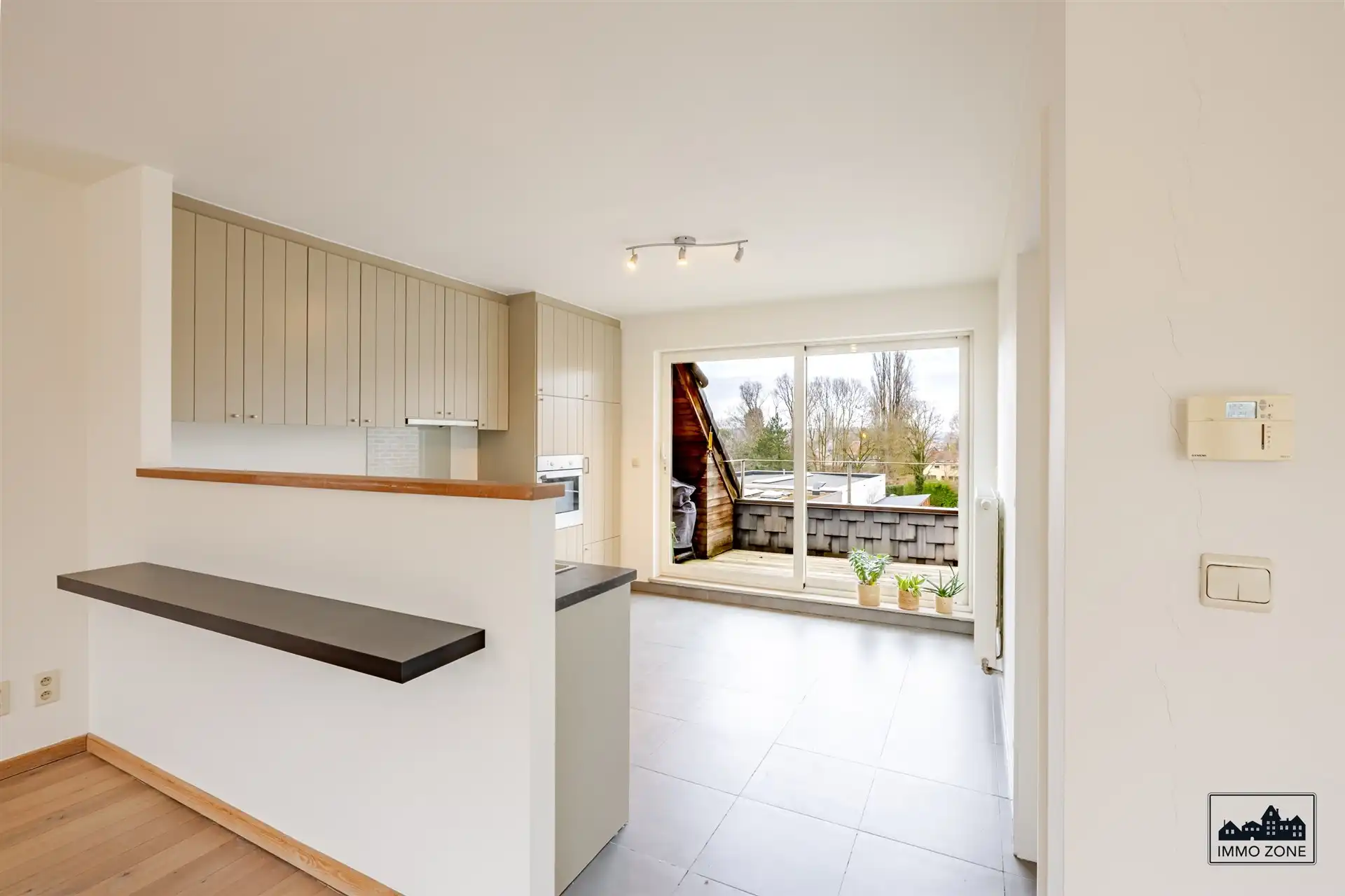 Ruim dakappartement (156 m²) met terras & garage foto 5