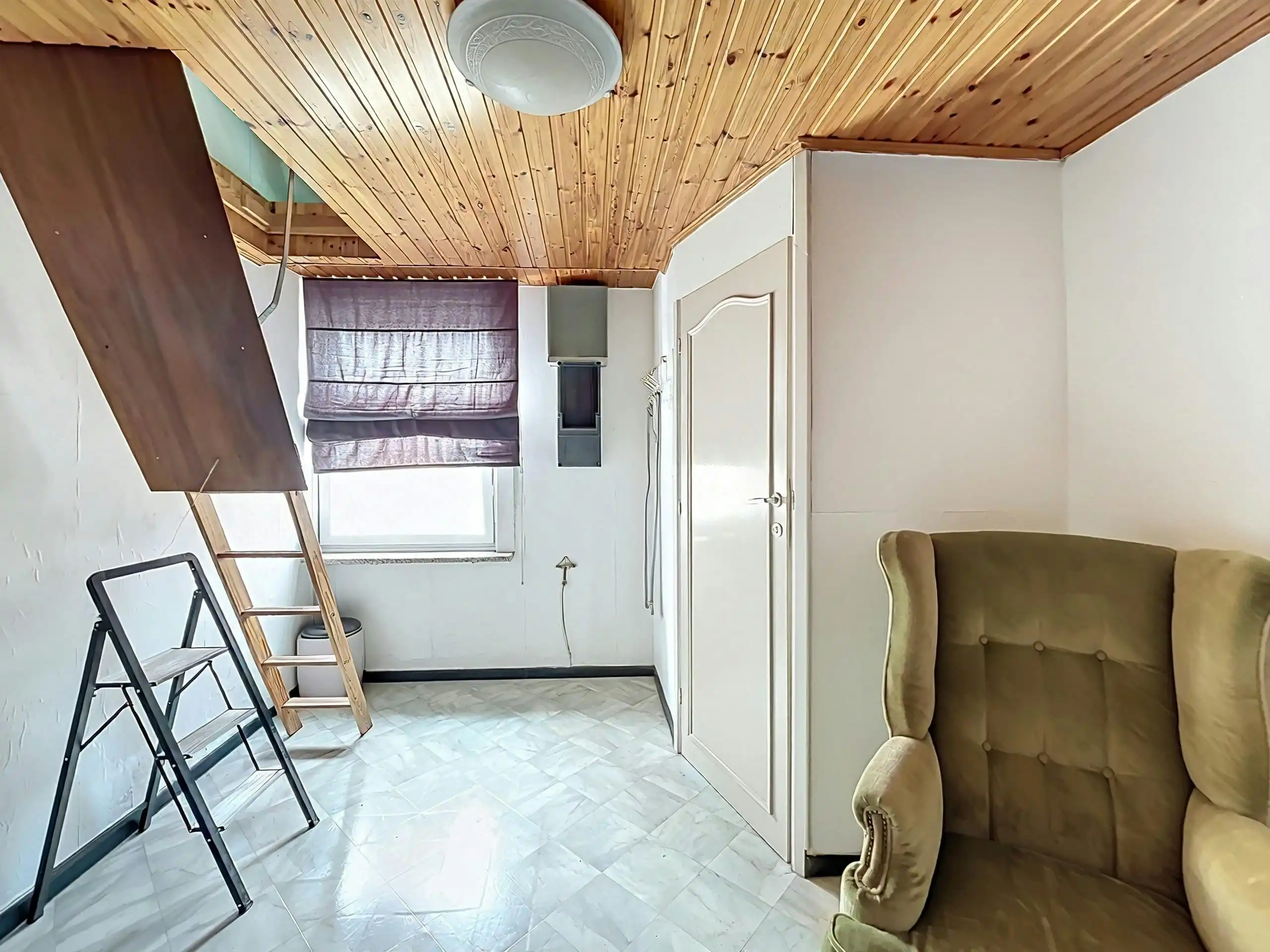 Te renoveren woning in het centrum van Ursel foto 9