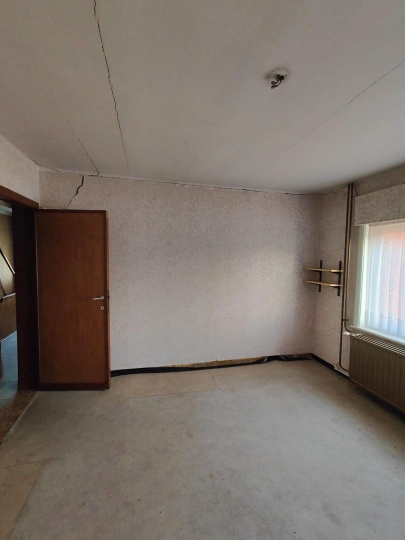 Woning met loods en voormalige showroom foto 14