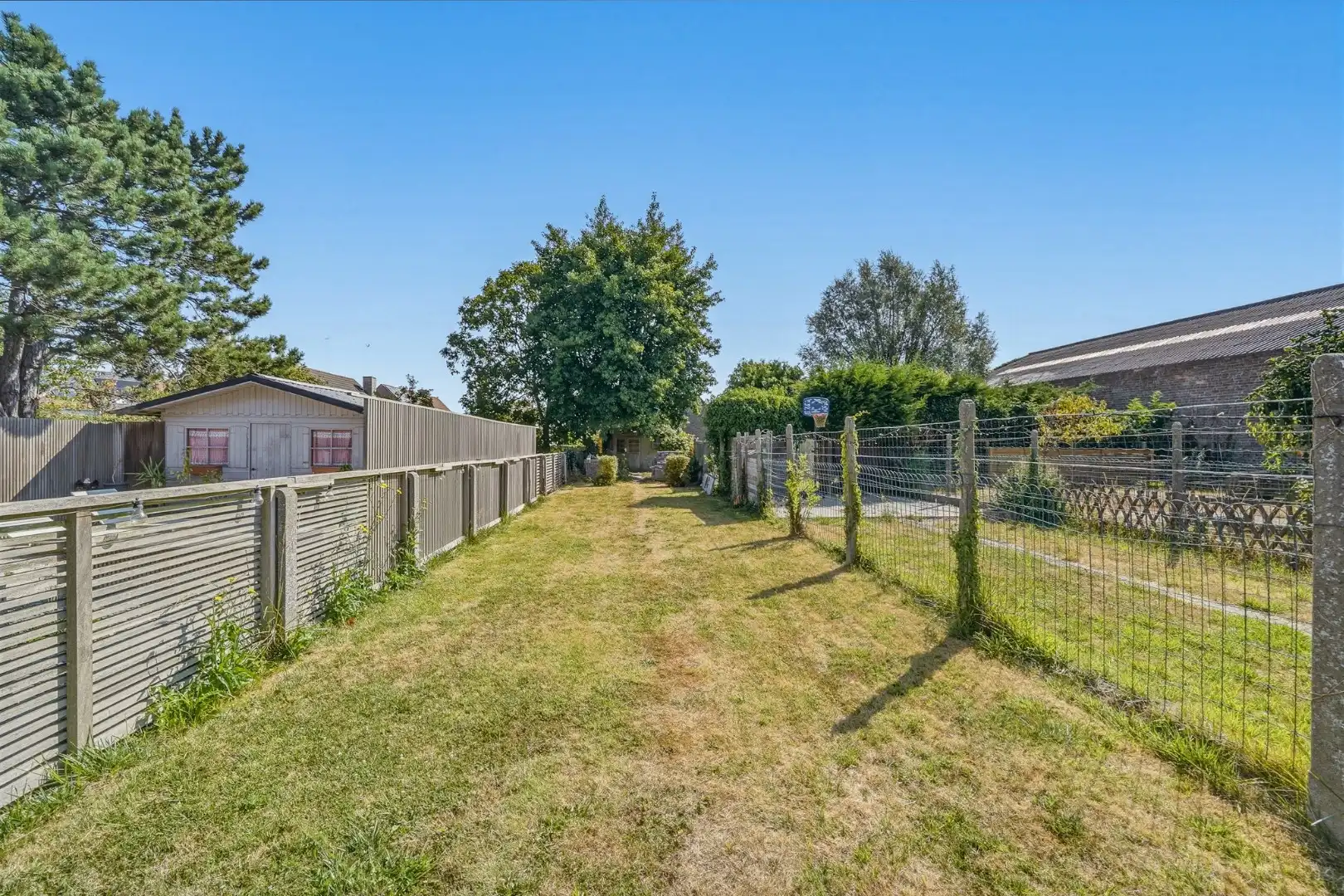 Te renoveren woning met ruime tuin in Bredene foto 8