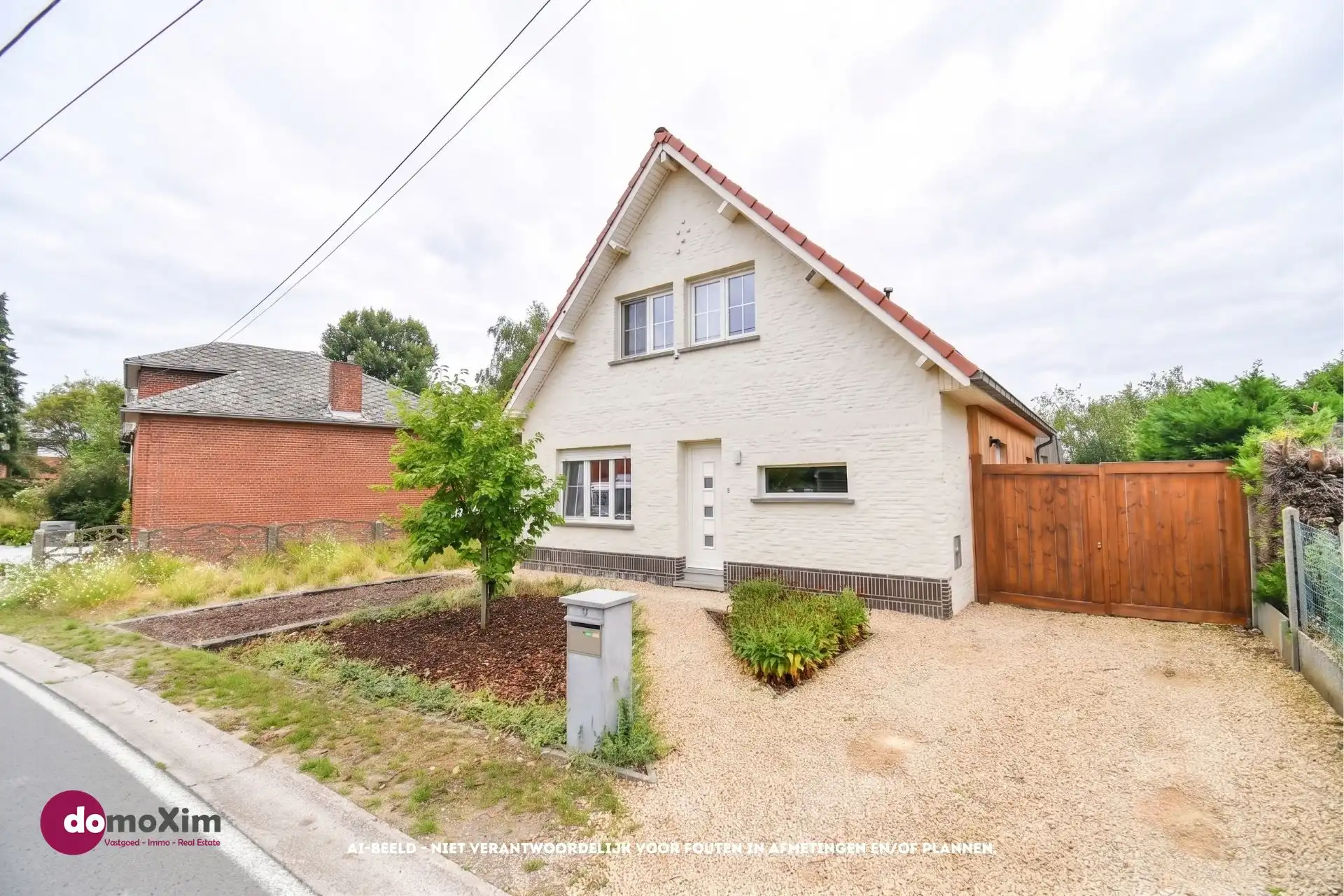 Moderne, gerenoveerde woning met leuke tuin in Boortmeerbeek foto 2