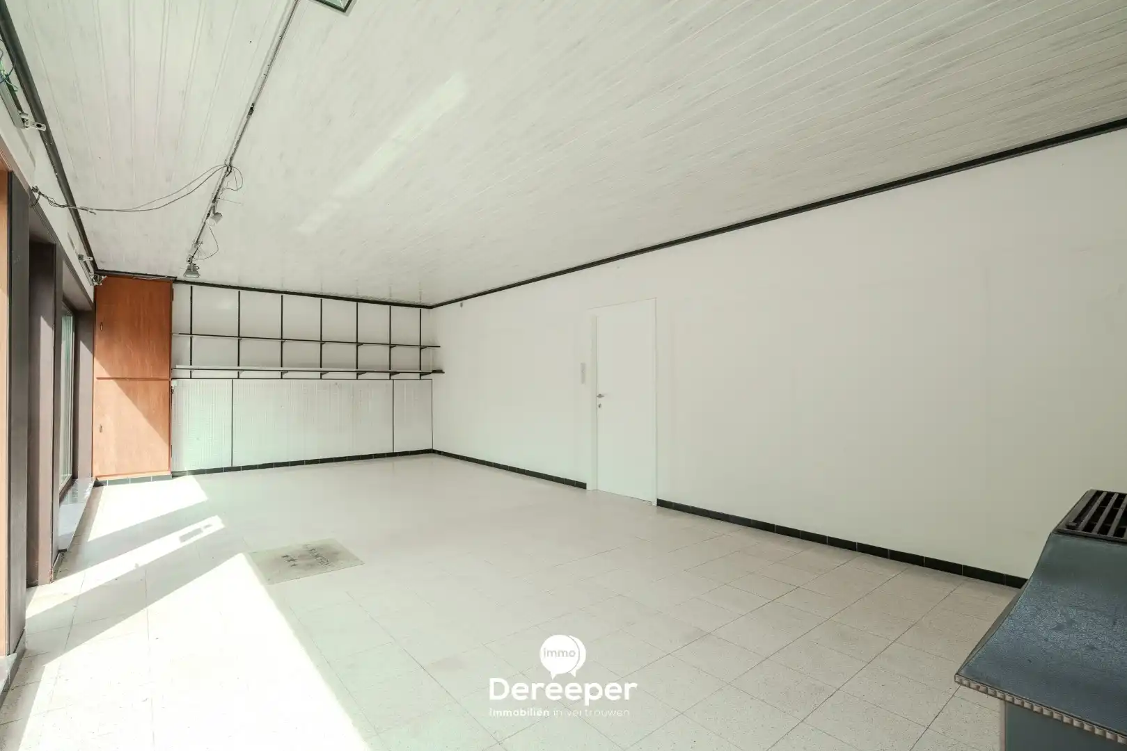 Commercieel pand met showroom, atelier, opslagplaatsen en woonst op toplocatie foto 12