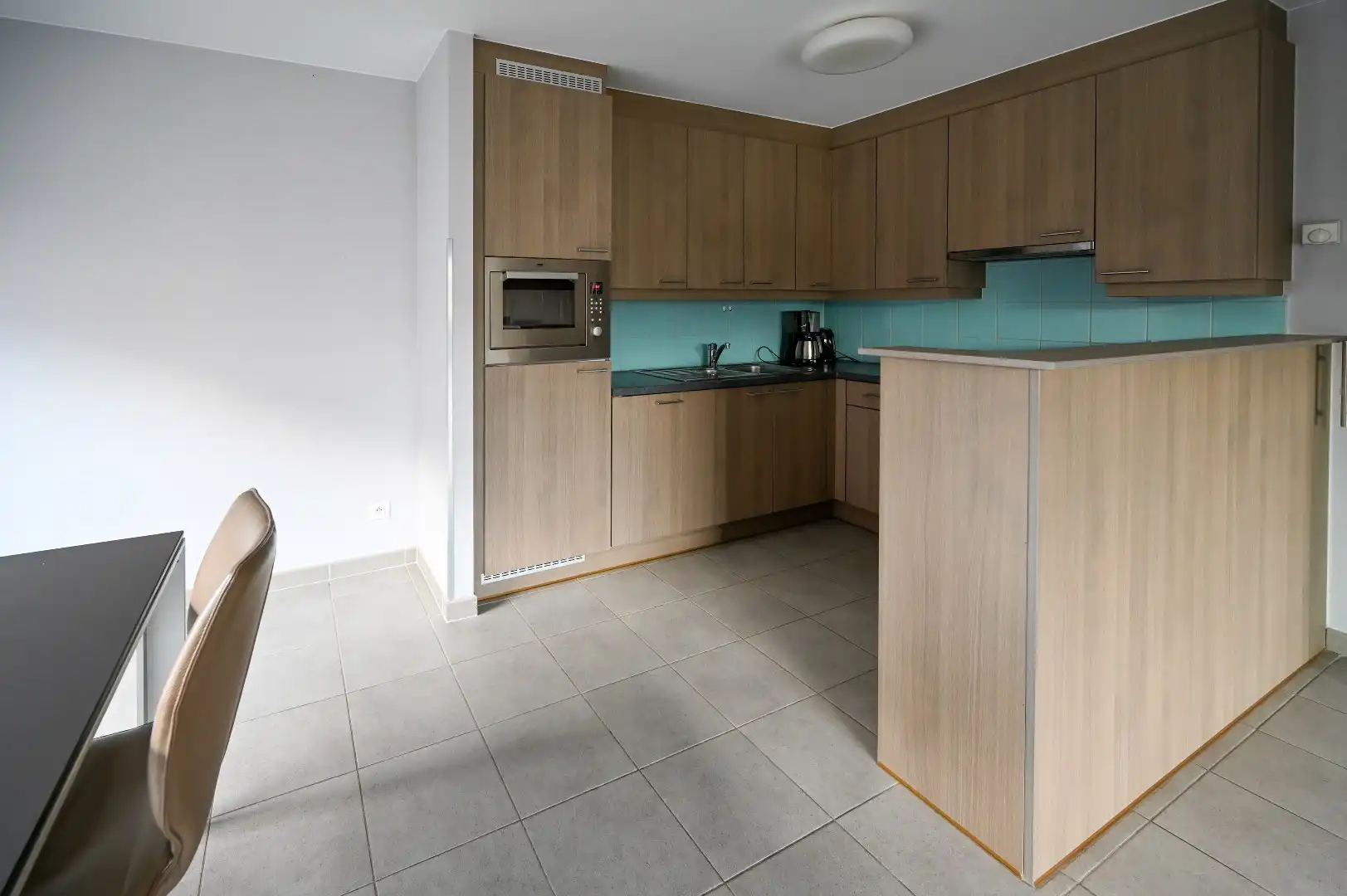Instapklaar éénslaapkamerappartement vlak bij zee foto 10