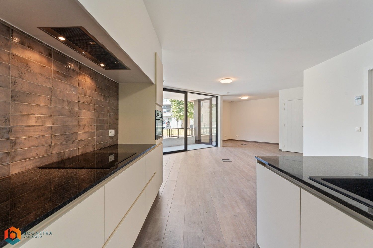 Gelijkvloers BEN appartement met autostaanplaats op toplocatie in Bonheiden foto {{pictureIndex}}