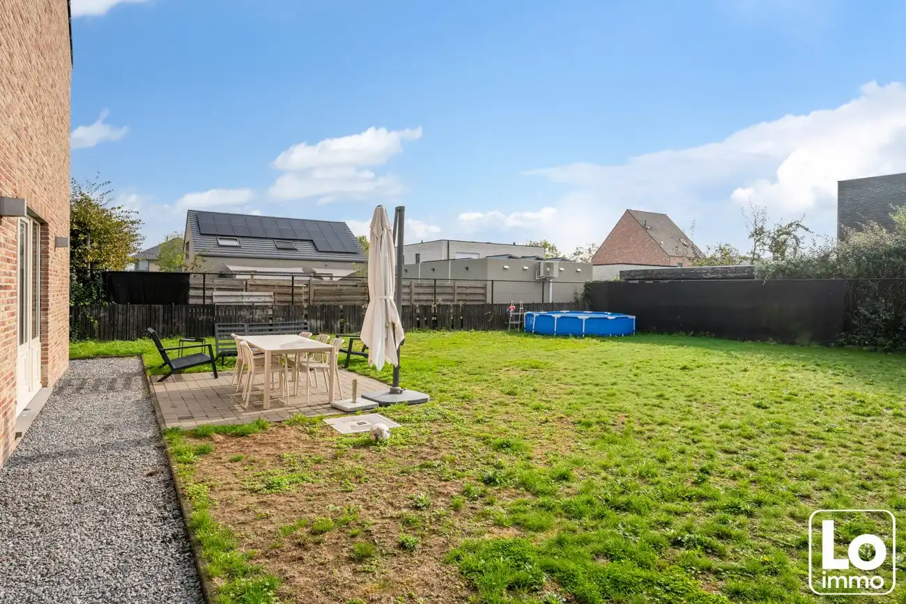 Instap klare ruime open woning met inpandige garage en een zuid georiënteerde tuin op een toplocatie nabij het centrum van Lochristi! foto 27