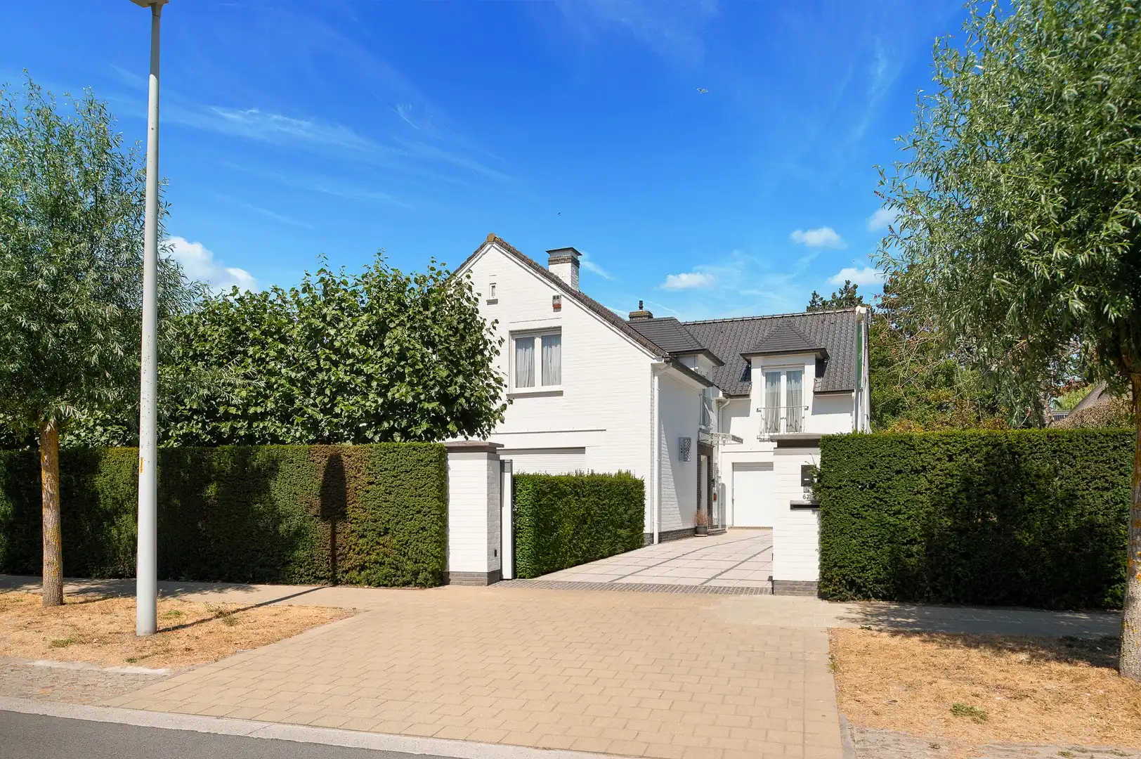 Alleenstaande villa met 5 slaapkamers met perfecte oriëntatie aan de Keuvelhoek. foto 2