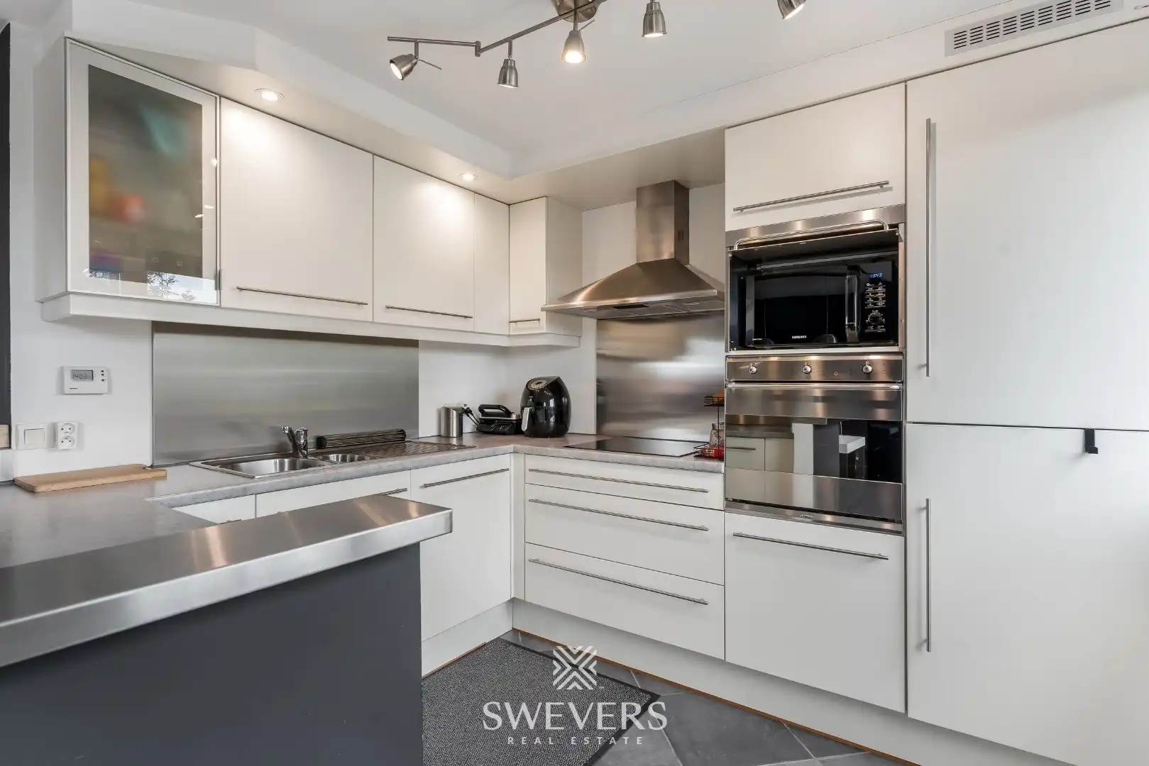 Ruim duplex appartement met 2 slaapkamers en garage foto 16