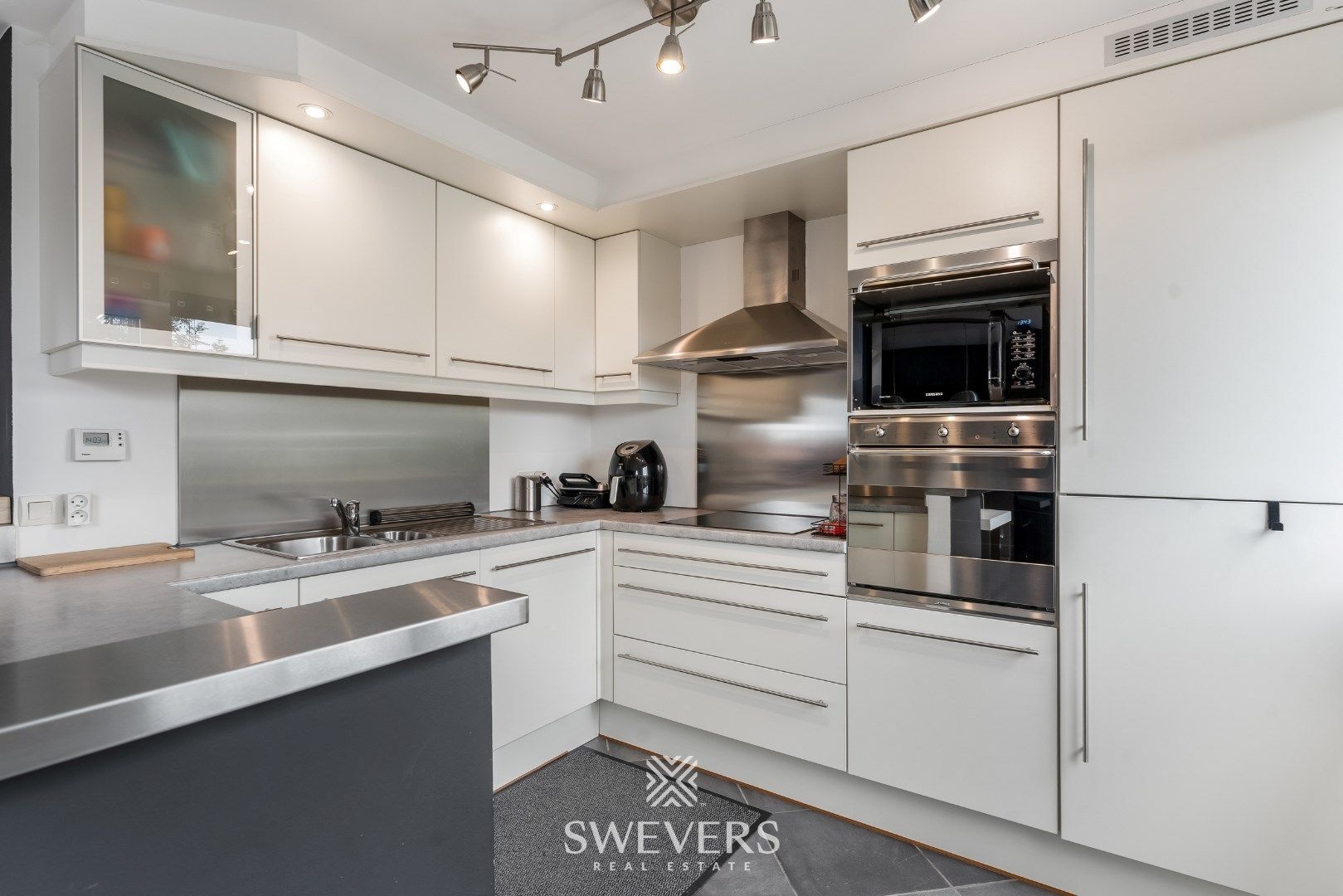 Ruim duplex appartement met 2 slaapkamers en garage foto 16