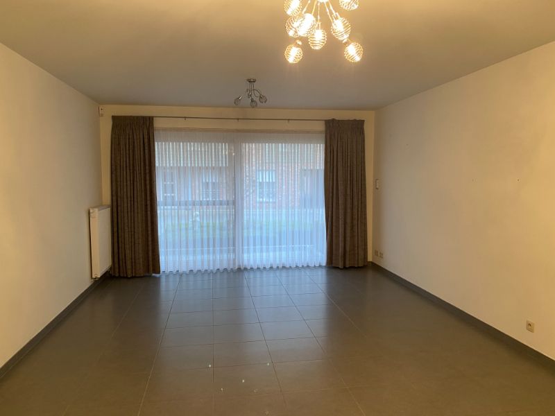 Gelijkvloers appartement met voor- en achtertuin en garage foto 6