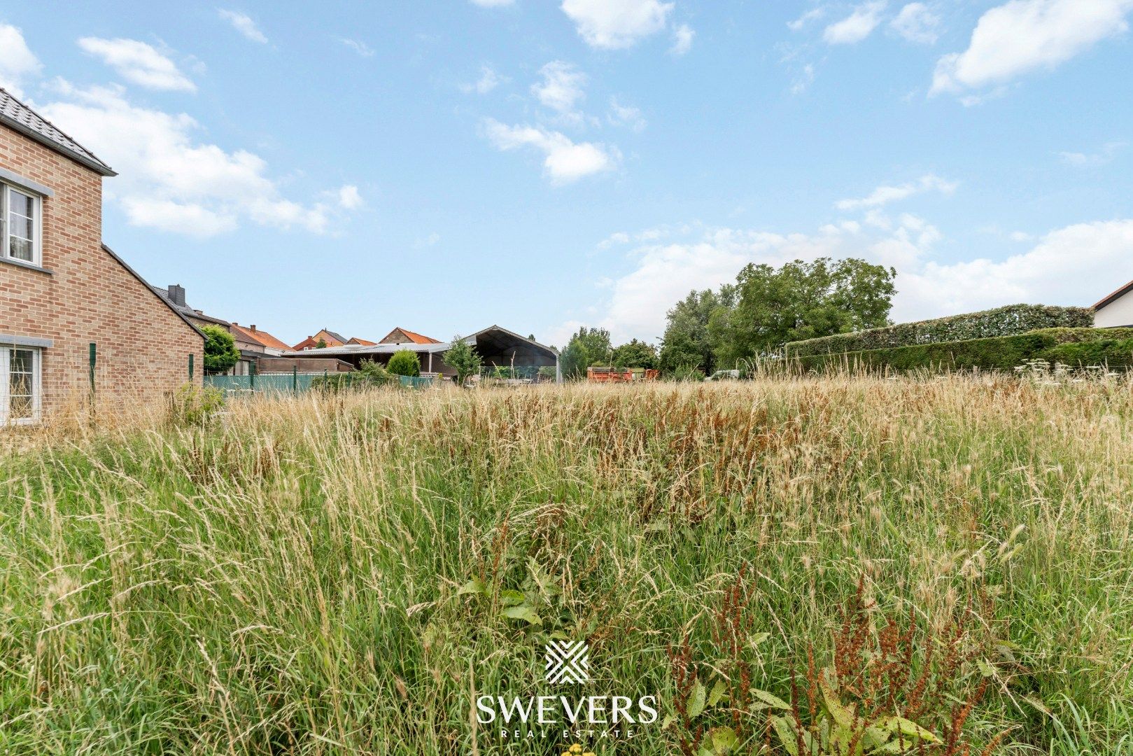 Charmant gelegen bouwgrond voor halfopen woning in Riemst foto 9