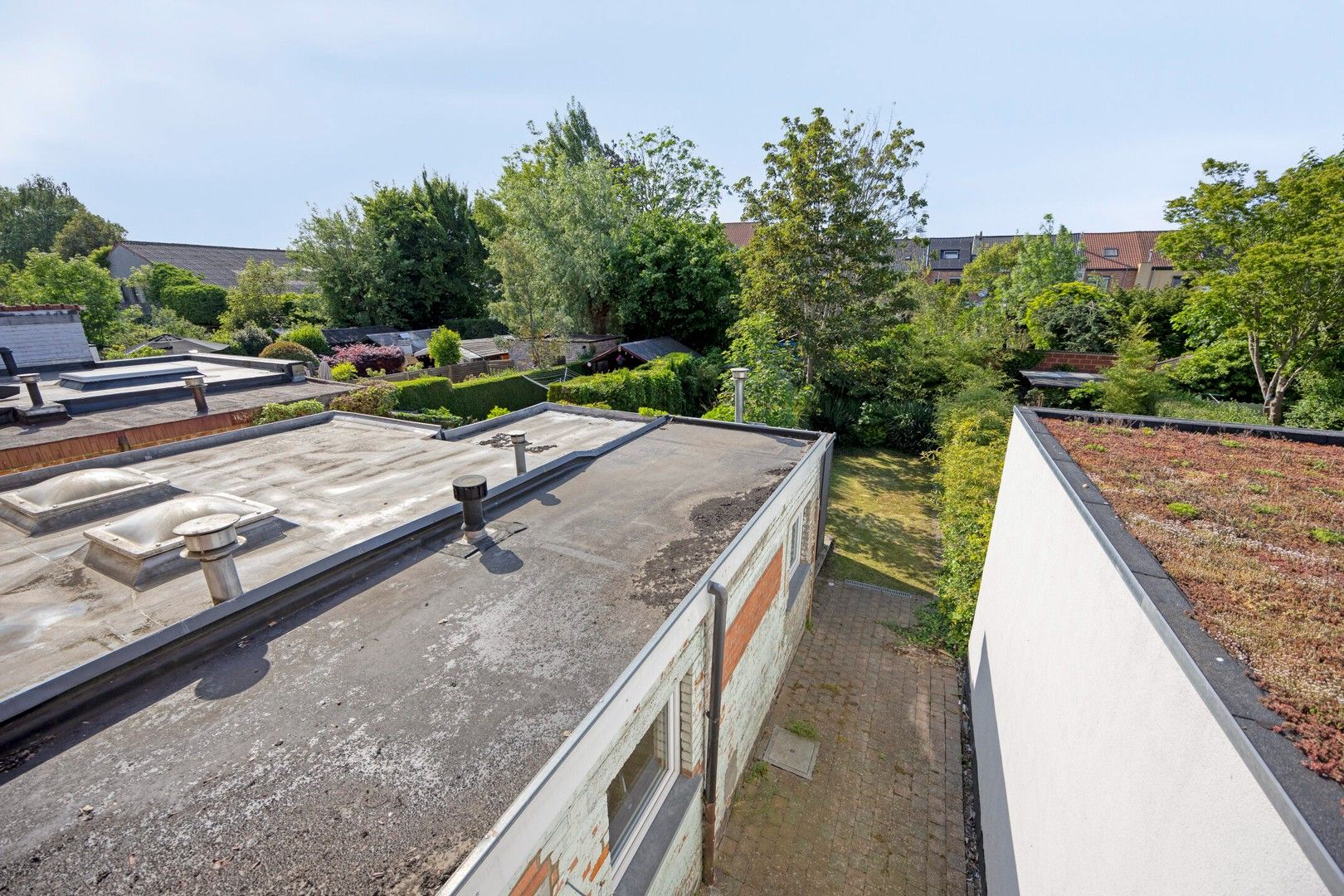 Op te knappen woning met oprit en tuin nabij de Gentbrugse Meersen foto 26