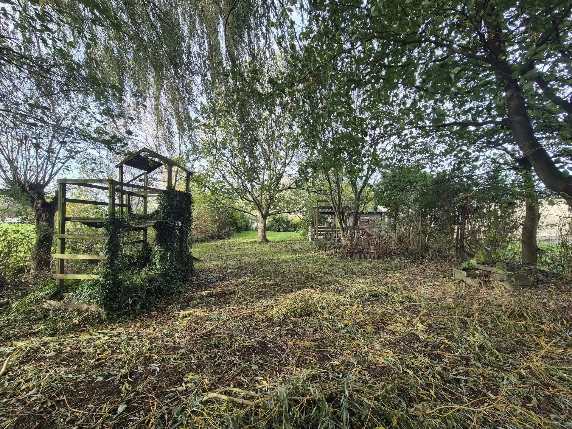 Karaktervolle open bebouwing met ruime tuin, op een vlot bereikbare locatie. foto 13
