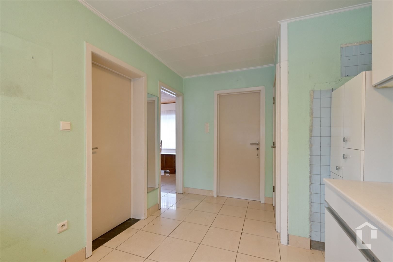 Te renoveren stadswoning tussen Gent en Oostakker foto 4