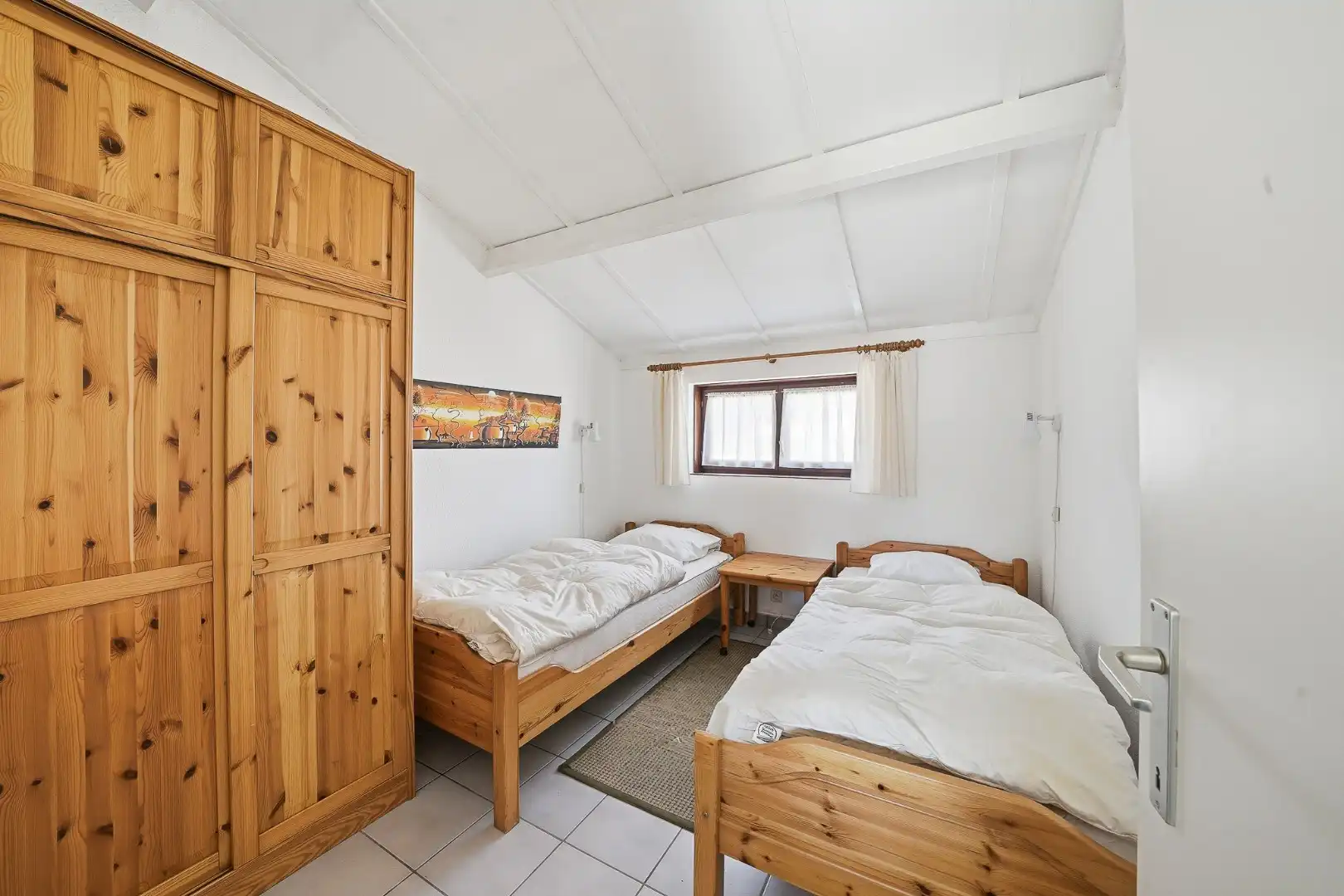 Instapklare vakantiewoning met zonnige tuin en 2 slaapkamers foto 7