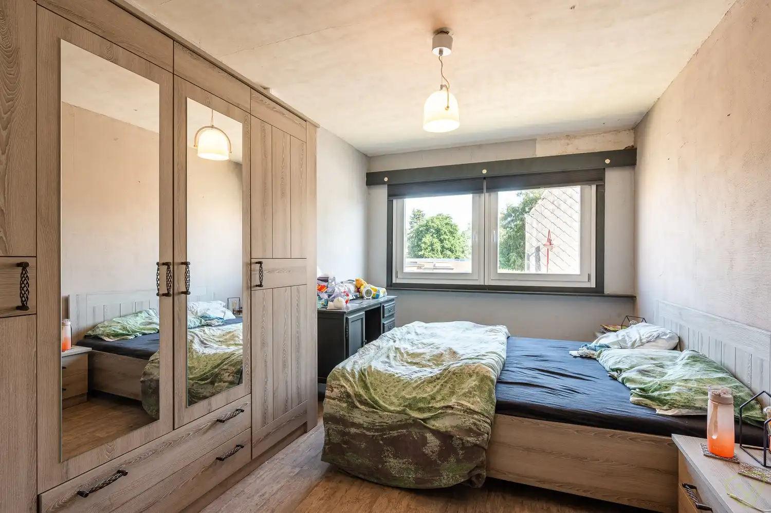 Te renoveren gezinswoning met grote tuin in het centrum van Bassevelde foto 10