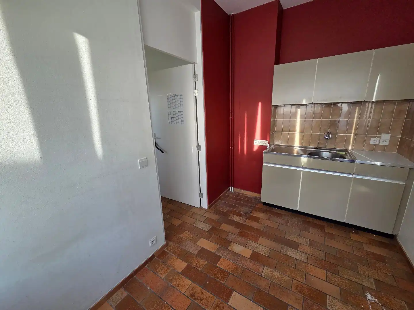 Ruim appartement met kantoorruimte in dorpskern Kampenhout foto 24