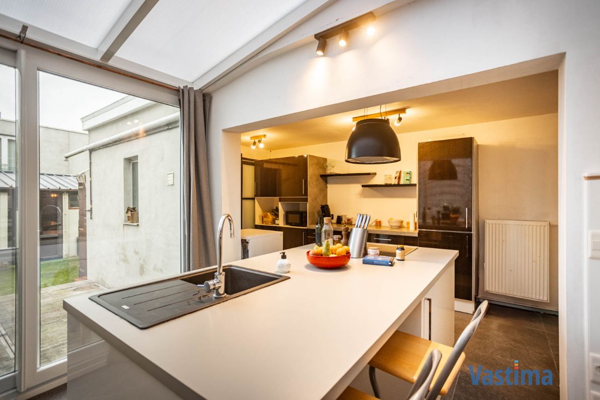 Gerenoveerde gezinswoning met tuin in Erembodegem foto 9