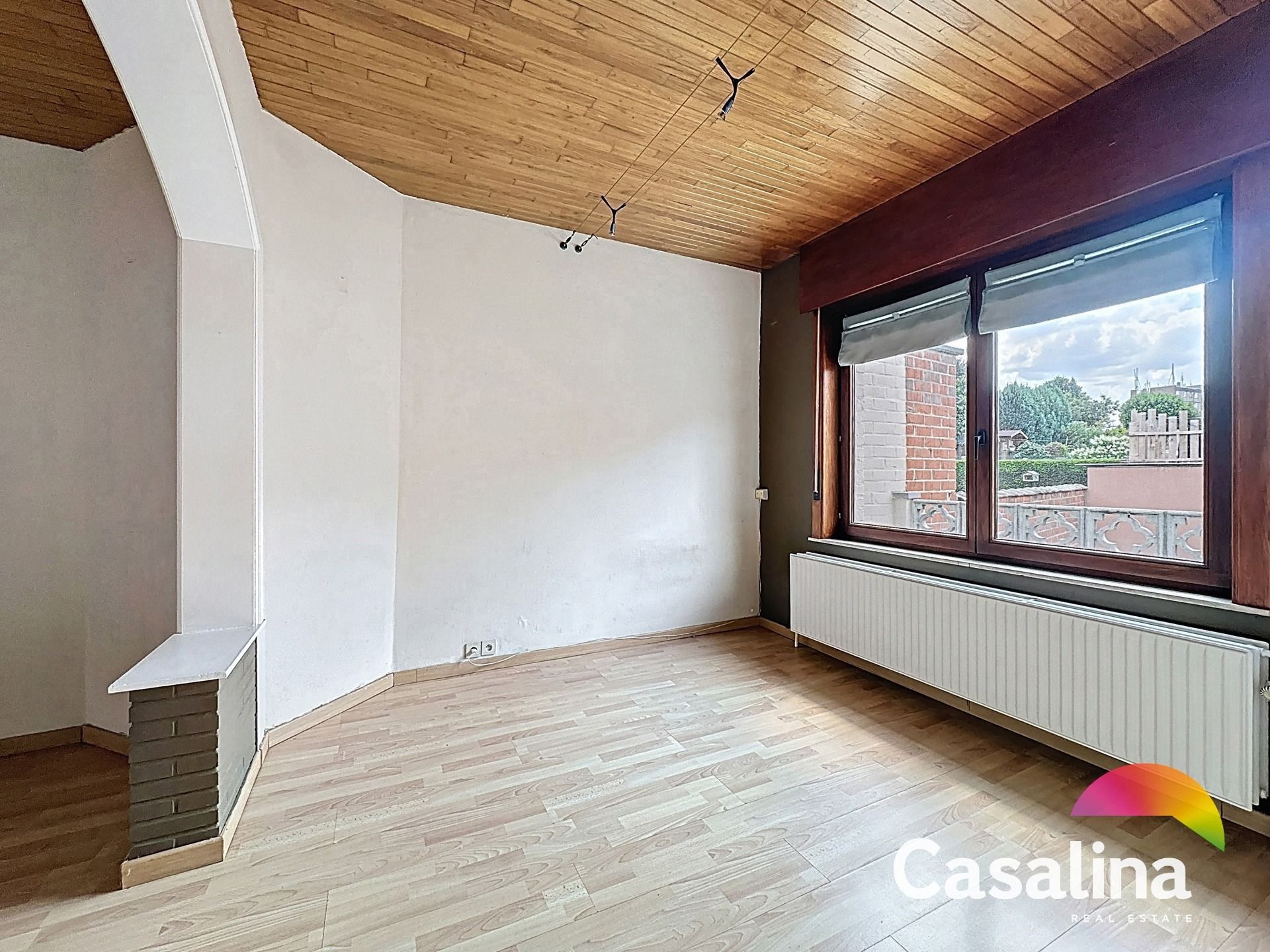 Een ruime te renoveren rijwoning van 207m² met zonnig terras foto 6