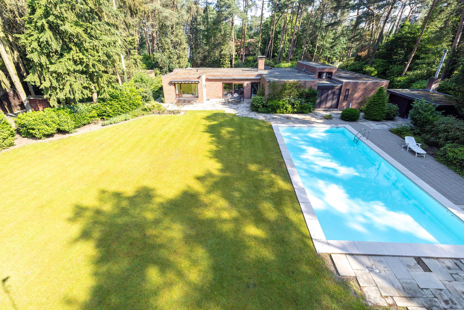 Laagbouwvilla met zwembad op 3.655m² + mog extra bouwgrond foto 3