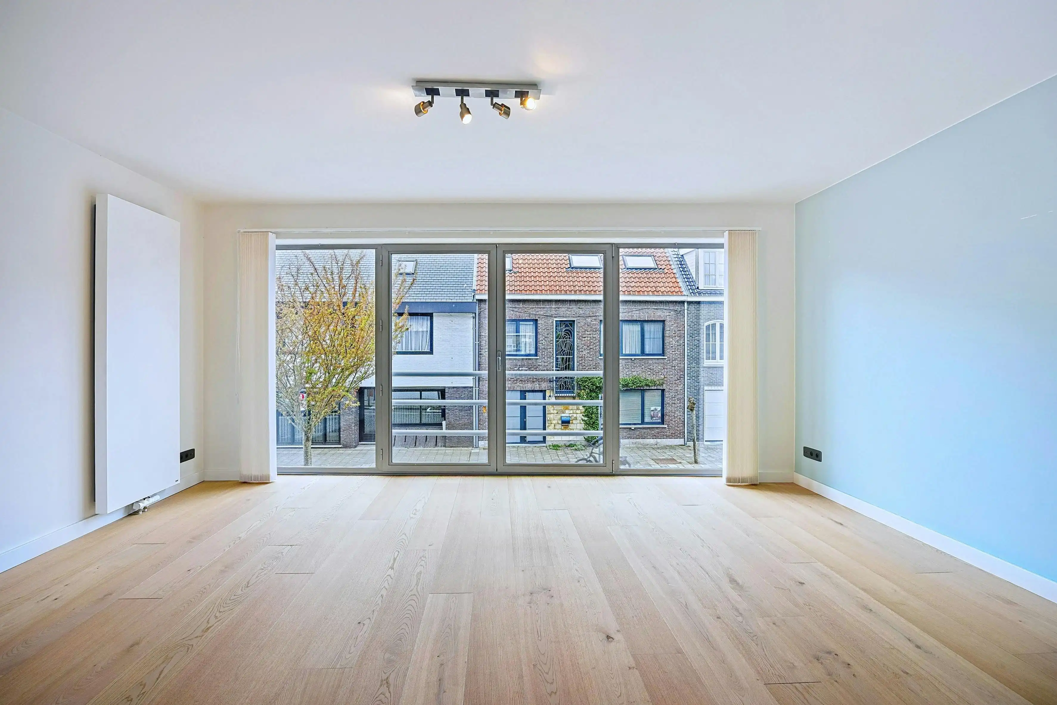 Instapklare bel-etage met 3 slaapkamers en zonnige tuin in hartje Eeklo foto 8