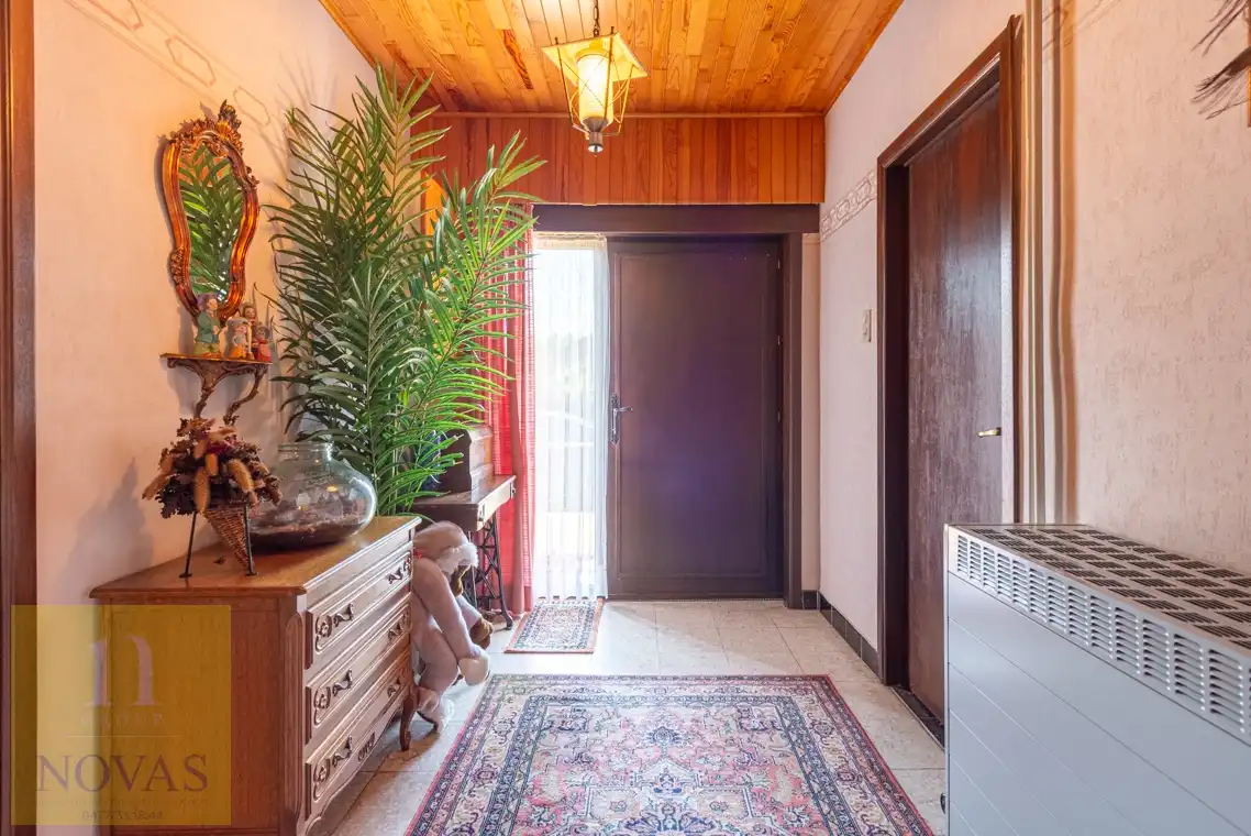 Landelijk gelegen woning op een perceel van 15 are, 23m straatbreedte foto 18