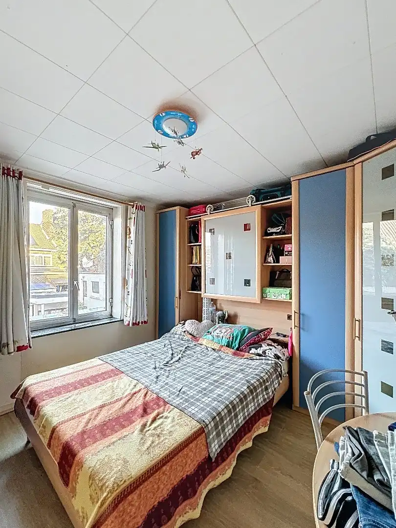 Gezellig wonen in Tienen: praktische rijwoning met terras en 3 slaapkamers foto 11