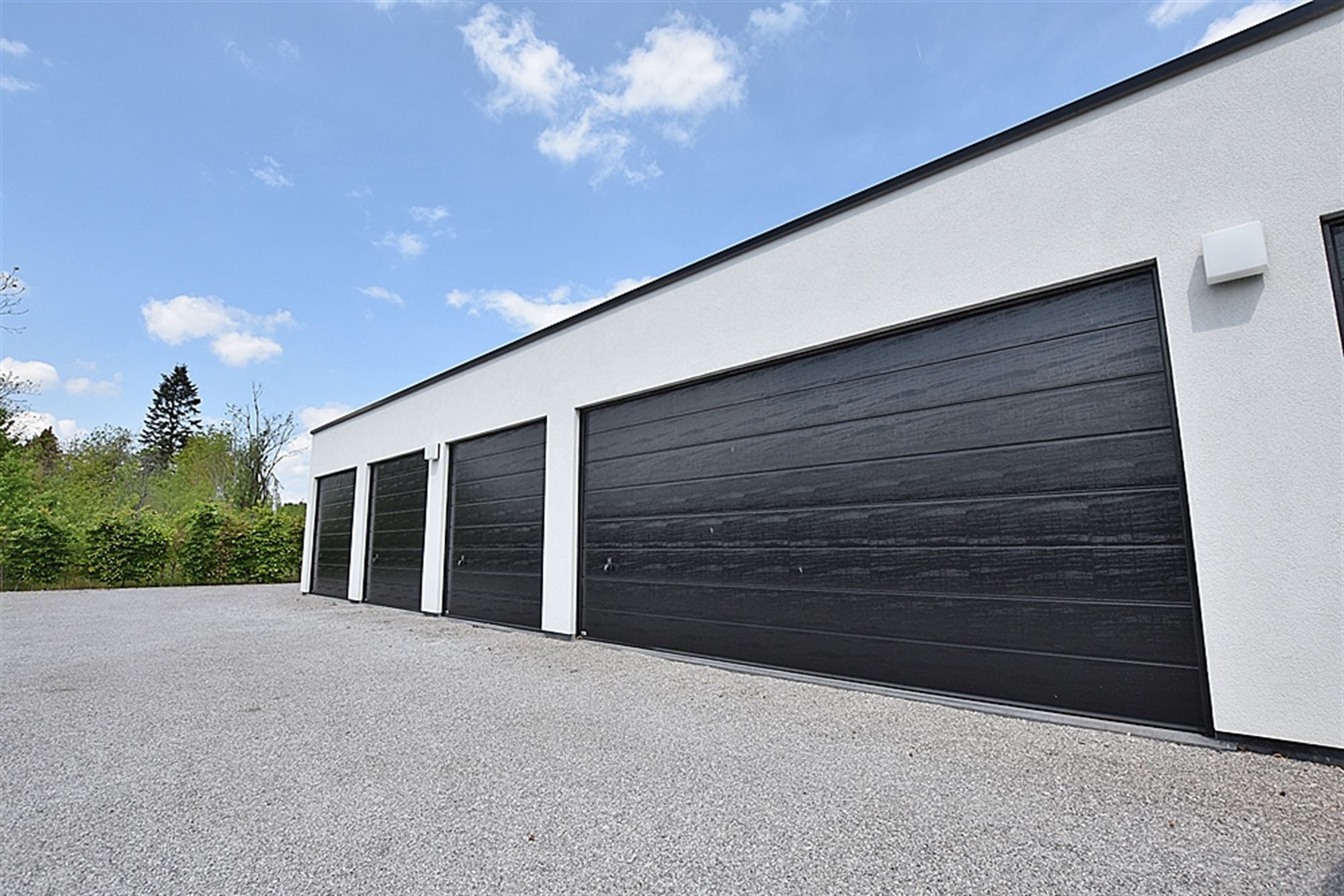 Aangenaam kwalitatief APPARTEMENT (gelijkvloers) met 2 slpks, tuintje/terras, ruime garage (tot 2 wagens) en kelderberging foto 14