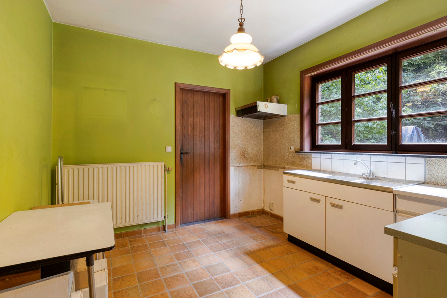 Te moderniseren rustig gelegen woning met 3/4 slaapkamers foto 10