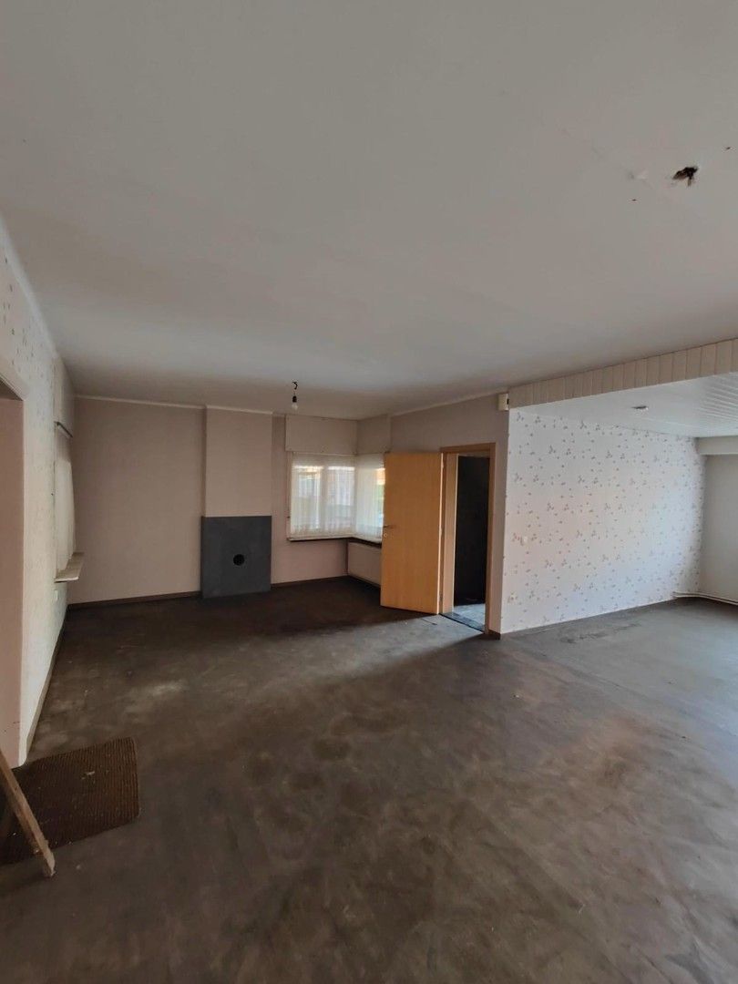 Woning met loods en voormalige showroom foto 9