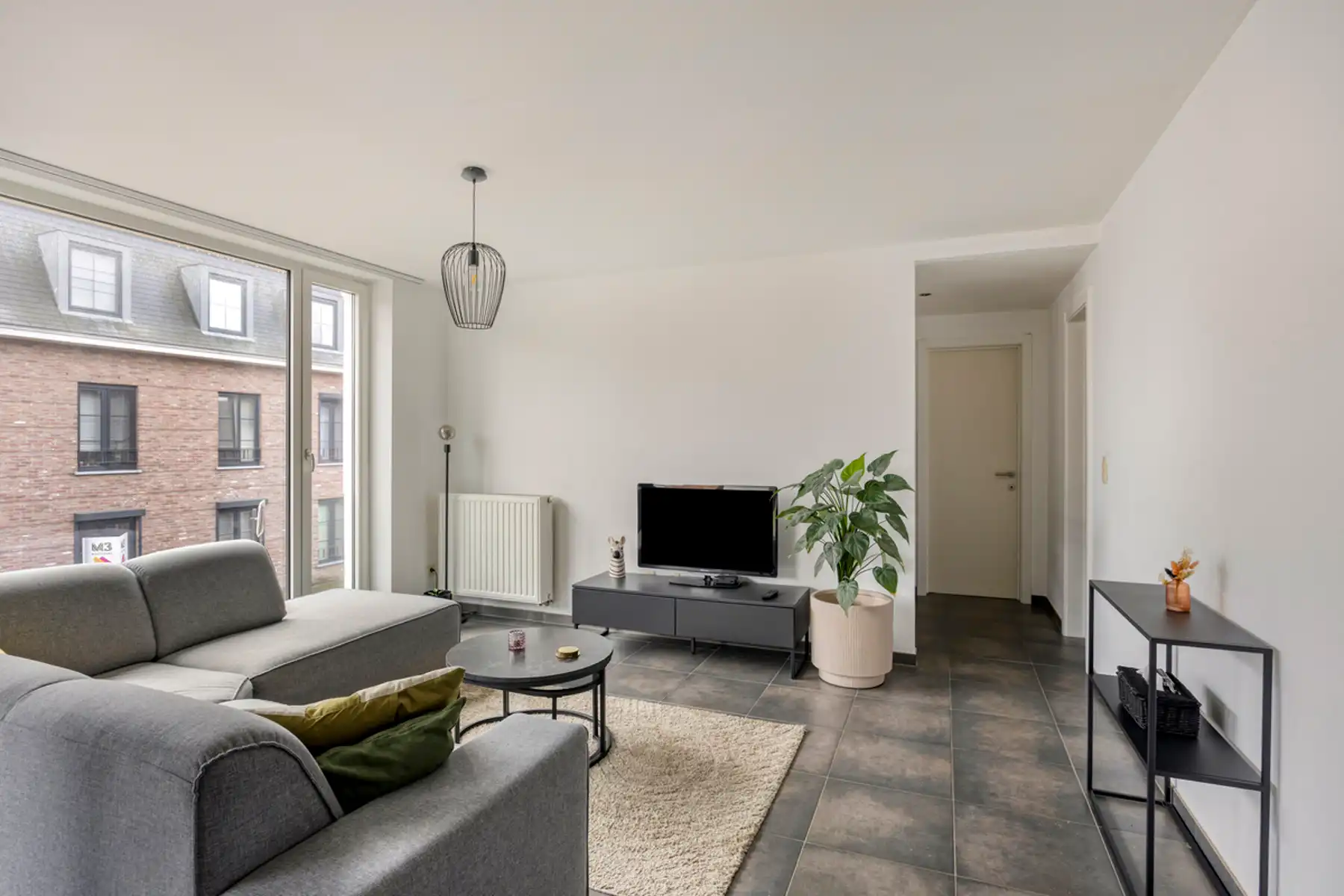 Energiezuinig appartement + autostaanplaats + kelder-berging foto 7