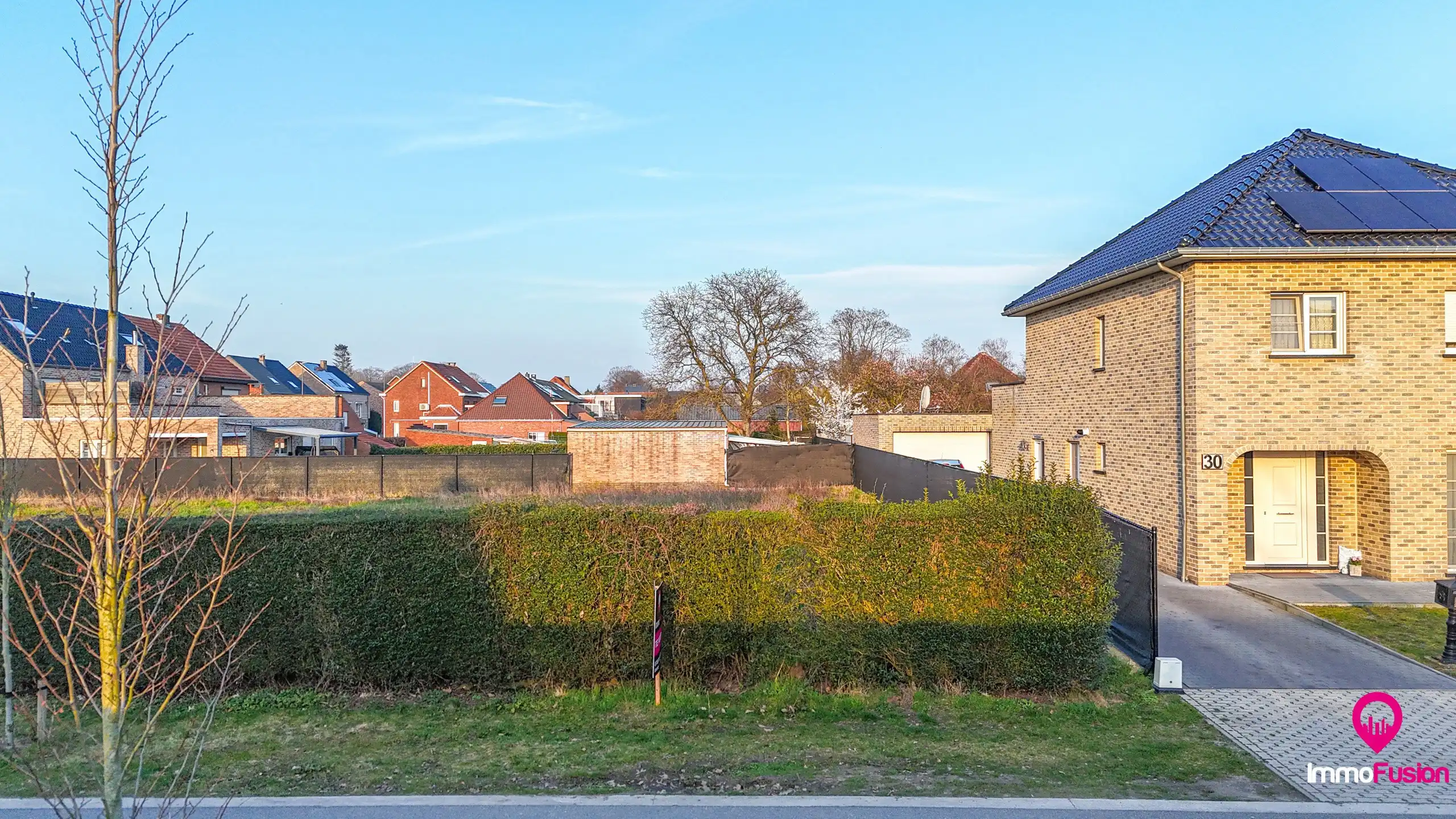 Bouwgrond voor open bebouwing aan rustige straat te Beringen! foto 3