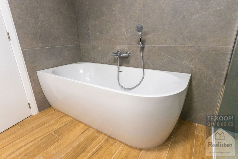Betaalbare en instapklare nieuwbouwwoning - OB met garage foto 13