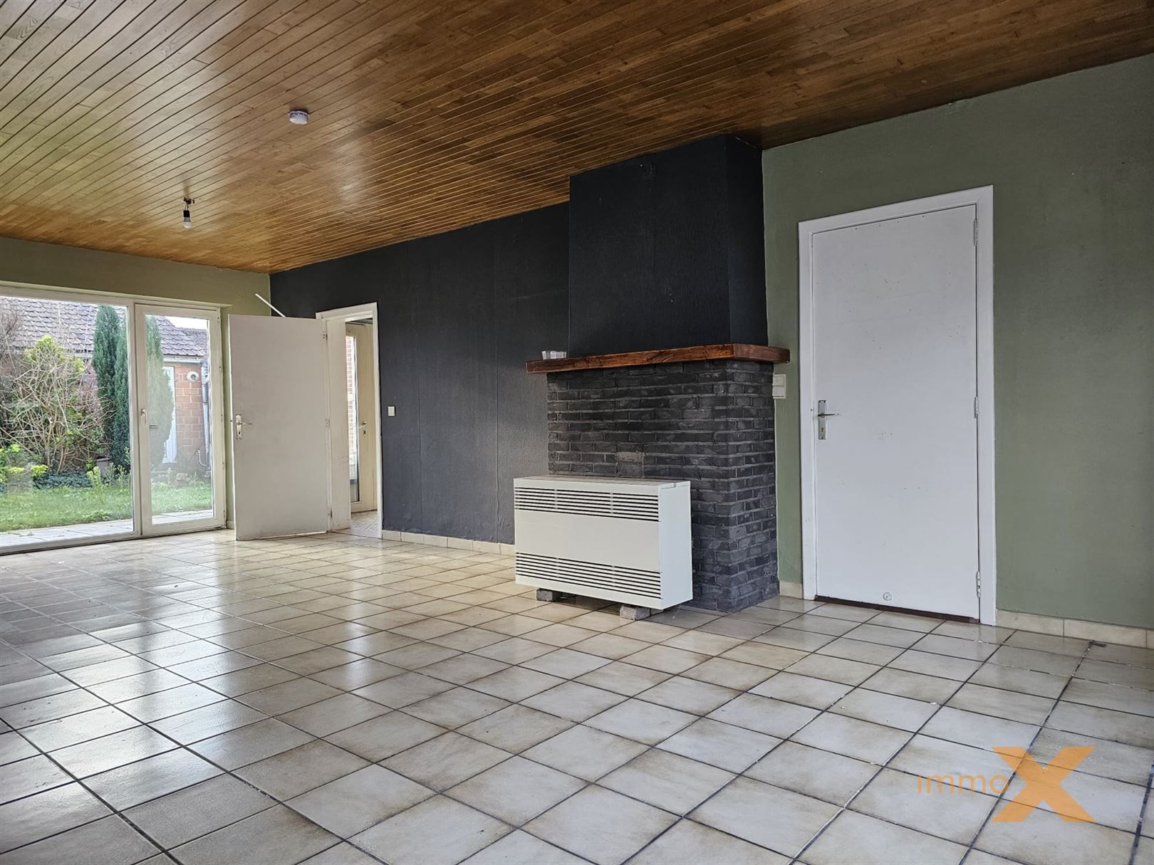 RUIME WONING MET DUBBEL GARAGE EN TUINTJE foto 7