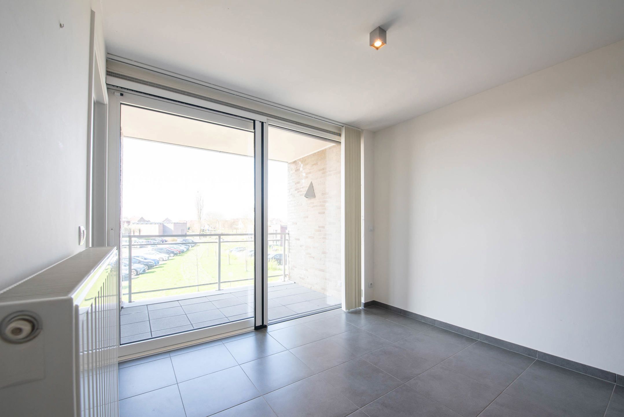 Serviceflat met autostandplaats & kelderberging foto 9