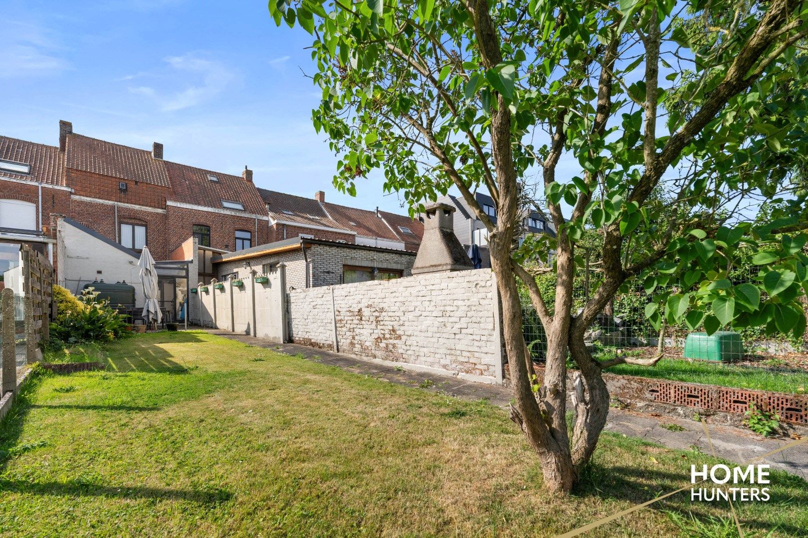 Te renoveren stadswoning met tuin en 3 slaapkamers foto 2
